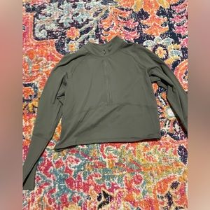 Camo color light athletic half up zip up size 4 never worn Lululemon